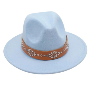 Detail of light blue wool fedora with brown faux leather band and silver rivet studs