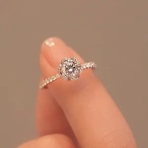 Exquisite rose-shaped simulated diamond ring in silver with sparkling pavé-set crystals