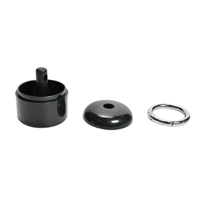 Detail view of black jewelry box components including dome lid, base, and silver metal clasp
