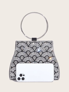 Luxurious black rhinestone clutch bag with silver metal ring handle shown next to a smartphone