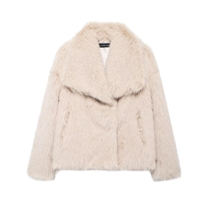 Detail shot of the plush faux fur texture and wide lapel on this cream crop jacket