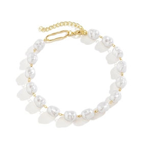 Baroque irregular pearl necklace with gold adjustable chain and lobster clasp on white background