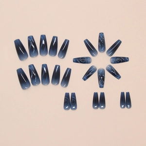 Deep blue marble gradient press-on nails in long ballerina shape with creative smoke texture