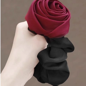 Elegant satin rose flower hair scrunchie in burgundy and black for stylish updos