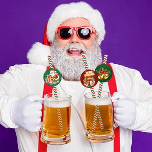 Christmas paper straws with festive Santa, reindeer, and bell cards for holiday parties