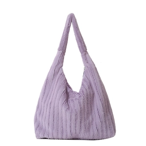 Purple faux fur tote bag with vertical stripes in a minimalist shoulder bag design