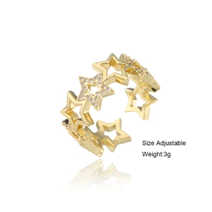 Adjustable hollow star ring in gold plating with cubic zirconia, weight 3 grams