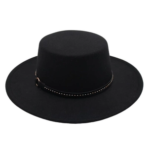 Detail of black boater hat with leather strap and decorative gold studs on the felt material