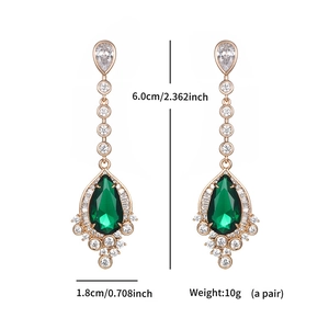 Detailed view of vintage gold emerald earrings with dimensions and sparkling cubic zirconia