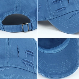 Distressed blue cotton baseball cap with rip details and adjustable back strap
