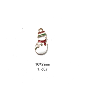 Detailed view of enamel snowman charm for DIY jewelry measuring 10x22mm and 1.60g