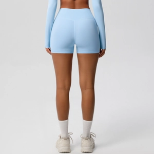 Rear view of high-waisted seamless scrunch yoga shorts in light blue with butt-lifting fit