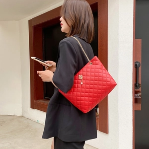 Red quilted leather tote bag with pearl crown charm and chain strap for women