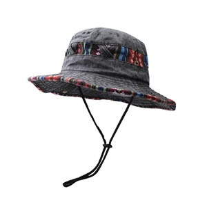 Detail showing vintage washed cotton fabric and ethnic geometric embroidery on sun hat