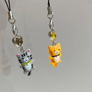 Cute Y2K retro cat keychains in grey and orange tabby designs with heart charms