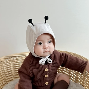 Cute newborn baby bumblebee earflap hat in light grey with black pompons for photography