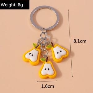 Detail showing dimensions of pear charms keychain with 8.1cm length and 8g weight