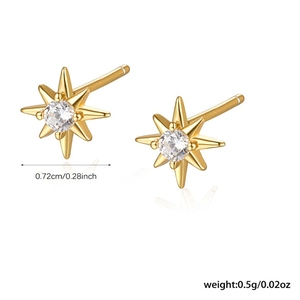 Macro view of gold S925 sterling silver star stud earrings with clear zircon details