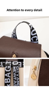 Detail view of contrast color backpack featuring high-quality zippers and metal charms