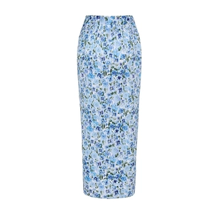 Detailed view of high-waisted floral maxi skirt in blue print for summer beach holiday
