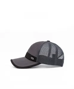 Side view of dark gray breathable mesh trucker hat with side logo for outdoor sports
