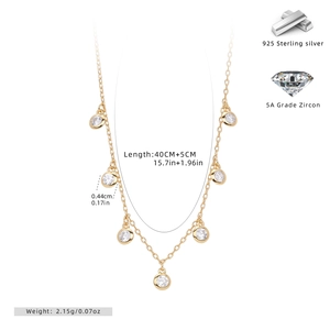 Detailed view of 925 sterling silver gold necklace with seven 5A grade zircon stones
