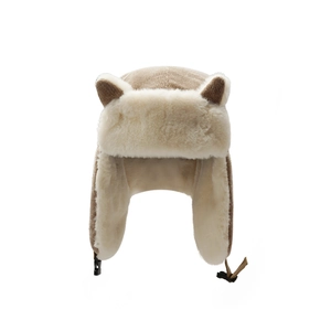 Beige knit trapper hat with cute ears and warm faux fur lining for women in winter