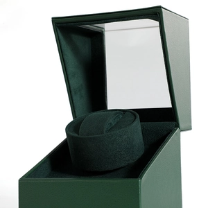 Automatic watch winder box in dark green leather with transparent glass window and velvet lining