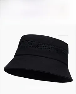 Detail of black mesh sun hat with breathable fabric and reinforced wide brim stitching
