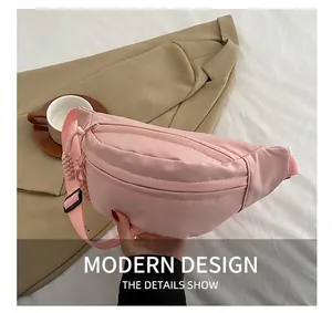 Detailed close-up of a pink leisure chest bag featuring adjustable straps and zipper details
