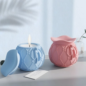 Elegant relief pattern candle jar set in blue and pink with lids for home decor