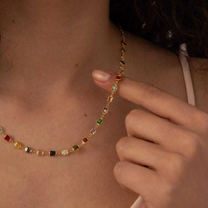 Square colored zircon necklace in 18k gold plating shown on a female model neck