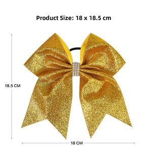 Detail view of 18cm gold glitter cheer bow with rhinestones and dimensions shown