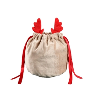 Beige velvet Christmas reindeer gift bag with red antlers and ribbon drawstring closure
