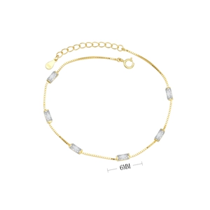 Detail of 925 sterling silver gold bracelet with rectangular cut zircon stones