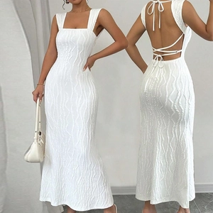 White sleeveless backless midi dress with textured vertical pleats and lace-up back