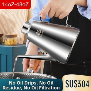 Action shot of pouring oil from a 304 stainless steel dispenser with a long spout