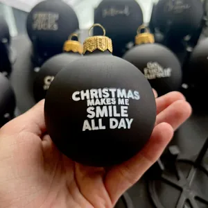 Funny matte black Christmas ornament with bold white text and a vintage gold metal cap