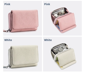Detail view of pink and white RFID leather wallets with compartments and zip pocket