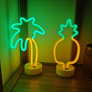 LED neon coconut tree and pineapple desk lamps with white bases for festive decor