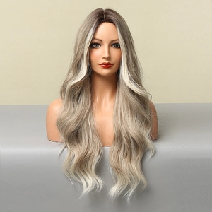 Detailed texture of wavy ombre blonde hair with dark roots and subtle highlights