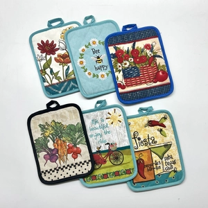 Set of 6 assorted thick quilted cotton kitchen pot holders with varied floral and bee prints
