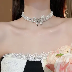 French style double-layer pearl necklace with a delicate hollow butterfly pendant for women