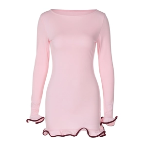 Detail of pink bodycon knit dress featuring ruffled cuffs and burgundy contrast hem edges