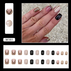 Sparkly gold glitter French V-tip almond fake nails with black geometric design set