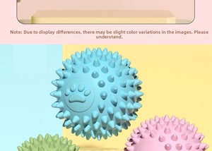 Three colorful TPR spiked dog balls with paw prints for massage and dental cleaning