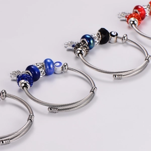 Adjustable stainless steel evil eye and Hamsa hand charm bracelets with colorful beads