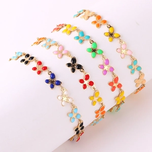 Colorful enamel butterfly bracelets set in various vibrant colors with gold plating