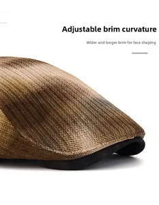Detail of a brown tie-dye beret with a foldable, widened brim for face framing