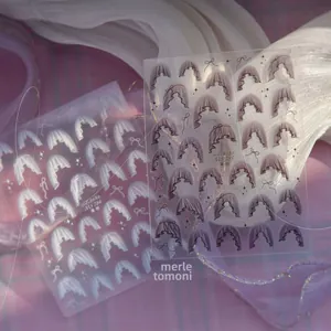 Detailed view of MS 784 and MS 785 nail stickers featuring French lace and bow designs
